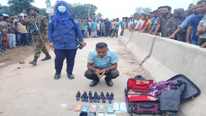 ফেন্সিডিল ও নগদ টাকাসহ গ্রেফতার মাদক কারবারি